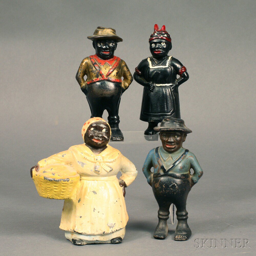 Appraisal: Four Painted Black Figural Still Banks th and th century