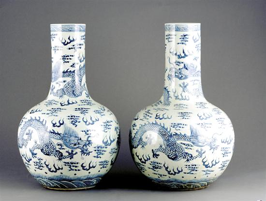 Appraisal: Pair blue-and-white porcelain vases long neck over bulbous body decorated