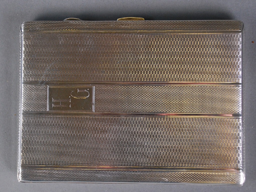 Appraisal: SILVER POCKET CIGARETTE CASE oblong with canted borders engine turned