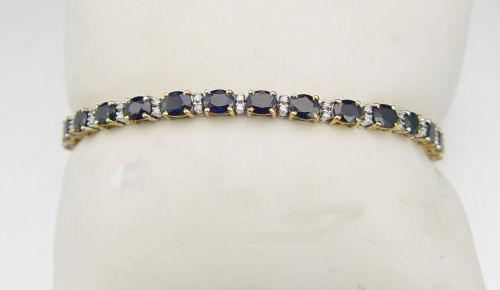 Appraisal: K SAPPHIRE AND DIAMOND LINE BRACELET K white gold with