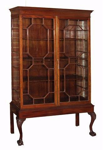 Appraisal: A LATE VICTORIAN CHIPPENDALE STYLE MAHOGANY DISPLAY CABINET the interior