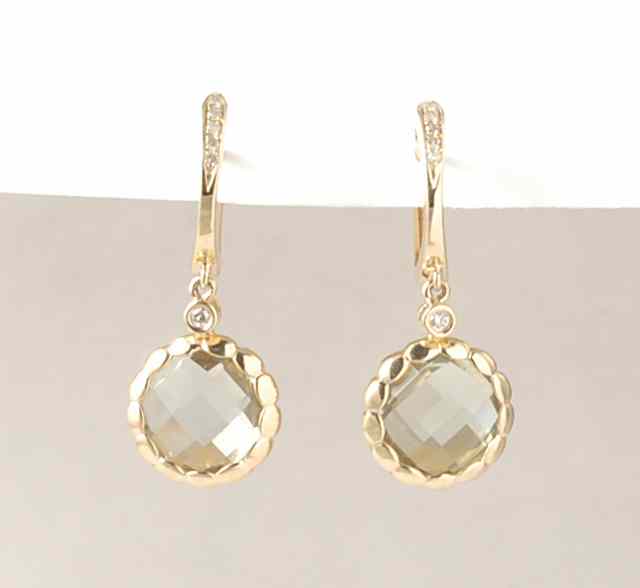 Appraisal: BLUE TOPAZ AND FOURTEEN KARAT GOLD PENDANT EARRINGS each featuring