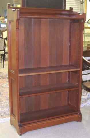 Appraisal: LATE VICTORIAN CHERRY BOOKCASE American late th century having an