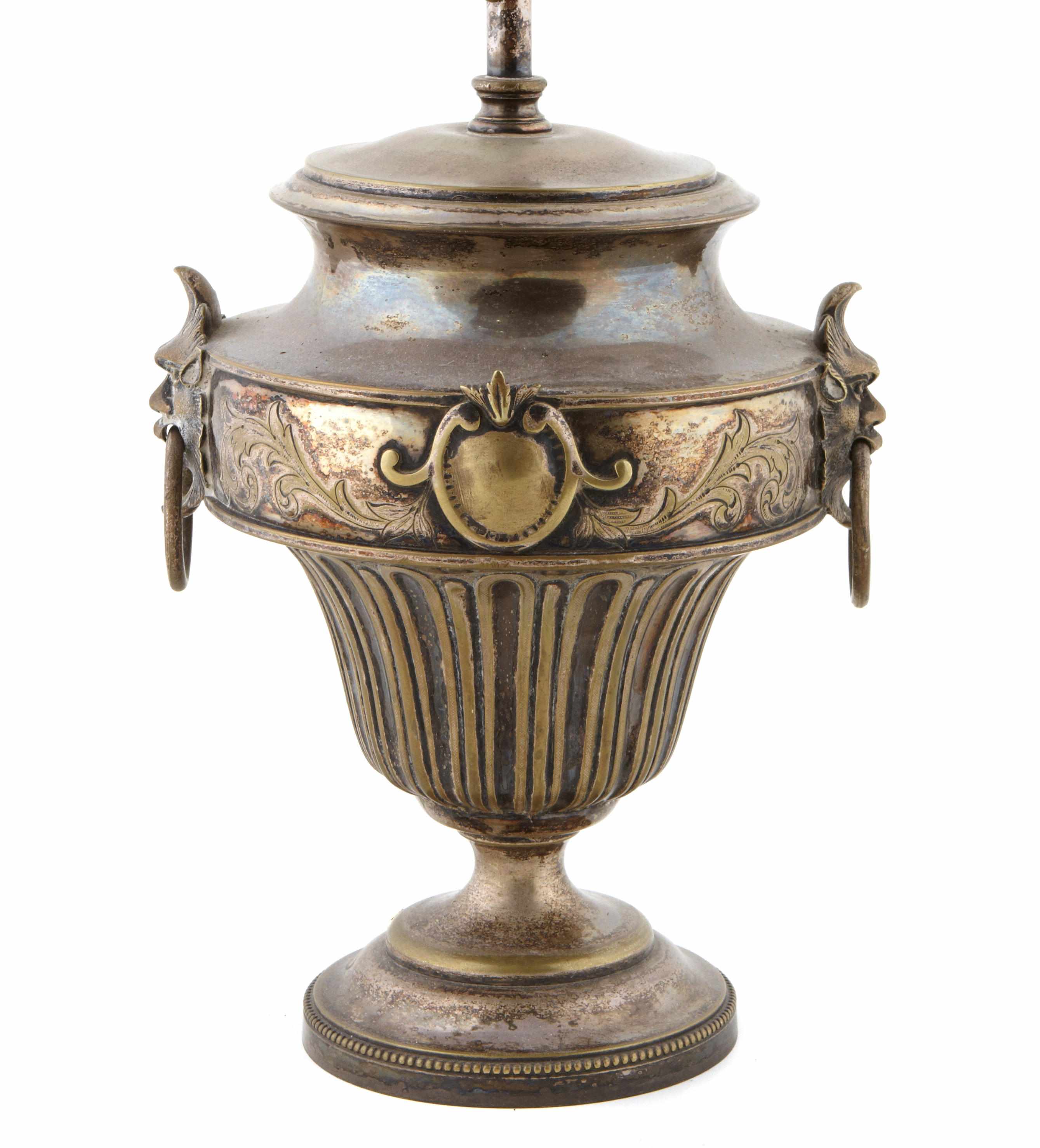 Appraisal: A pair of silvered brass urn-form lamps th centuryOverall height