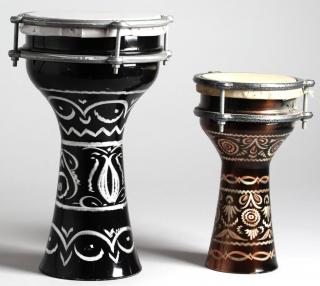 Appraisal: Middle Eastern Etched Metal Doumbek Drums The taller with a