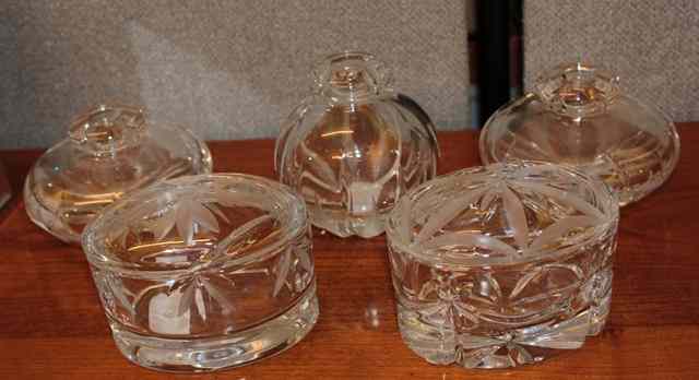 Appraisal: TWO CUT GLASS OVAL LIDDED BOXES wide together with three