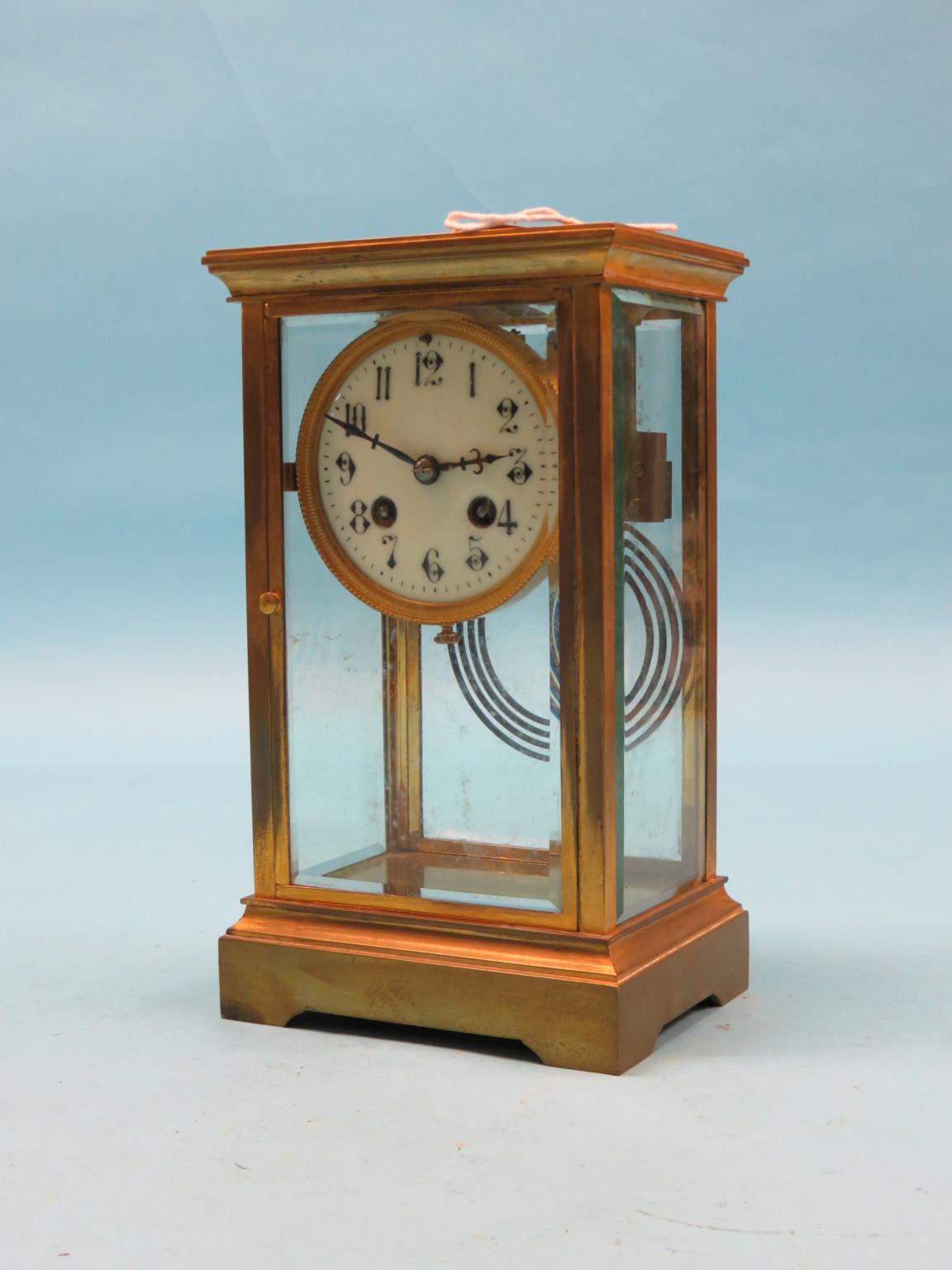 Appraisal: A French four-glass mantel clock enamelled dial -day movement striking