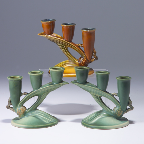 Appraisal: Three ROSEVILLE Pine Cone triple candlesticks - two green and