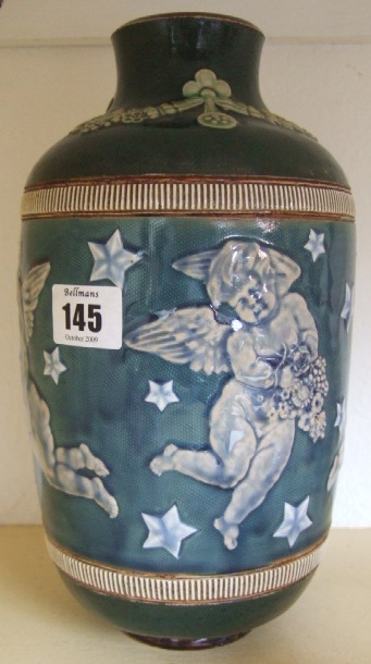 Appraisal: A Doulton saltglaze stoneware vase relief moulded with cherubs in