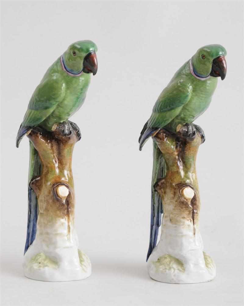 Appraisal: PAIR OF CONTINENTAL PORCELAIN FIGURES OF GREEN PARROTS Blue C