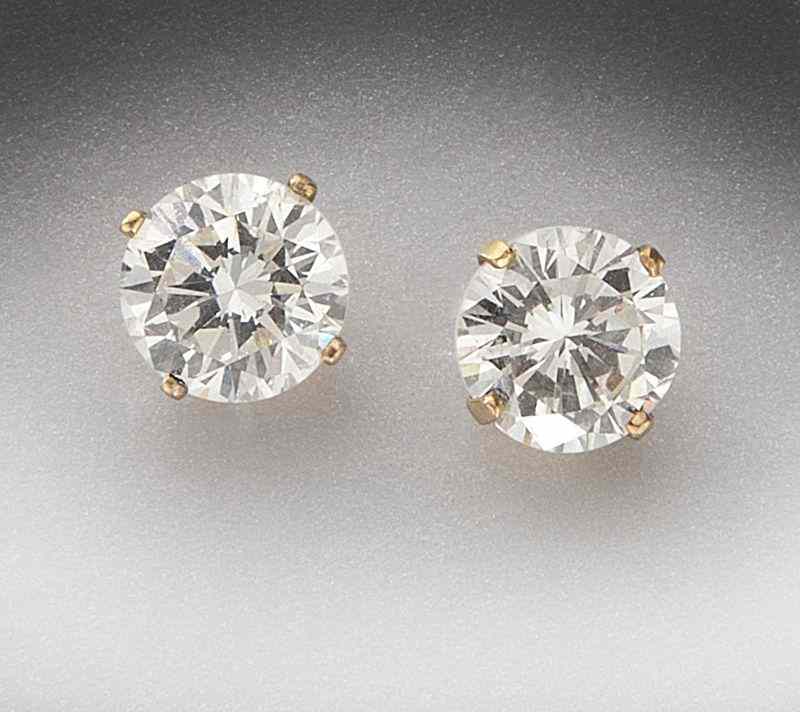 Appraisal: K gold and diamond ear studscontaining a pair of round