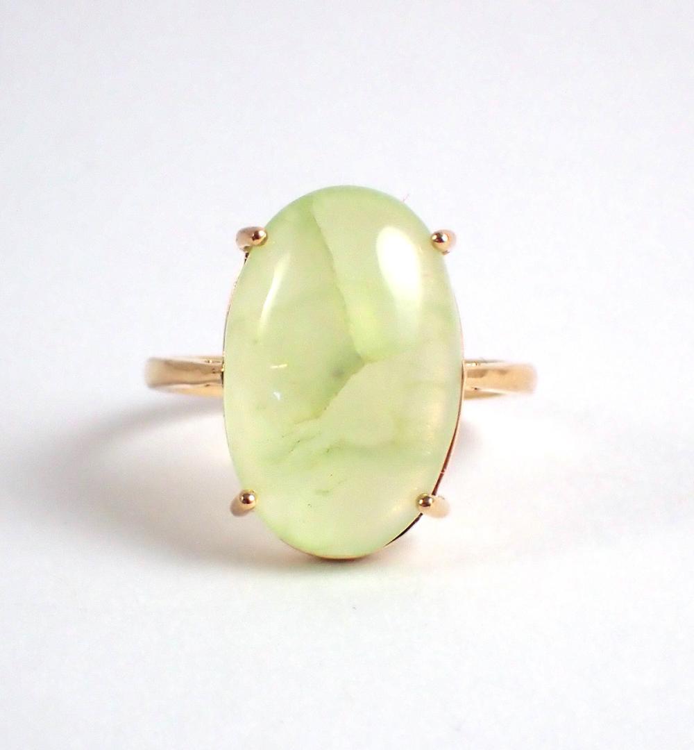 Appraisal: PREHNITE AND FOURTEEN KARAT GOLD SOLITAIRE RING The k yellow