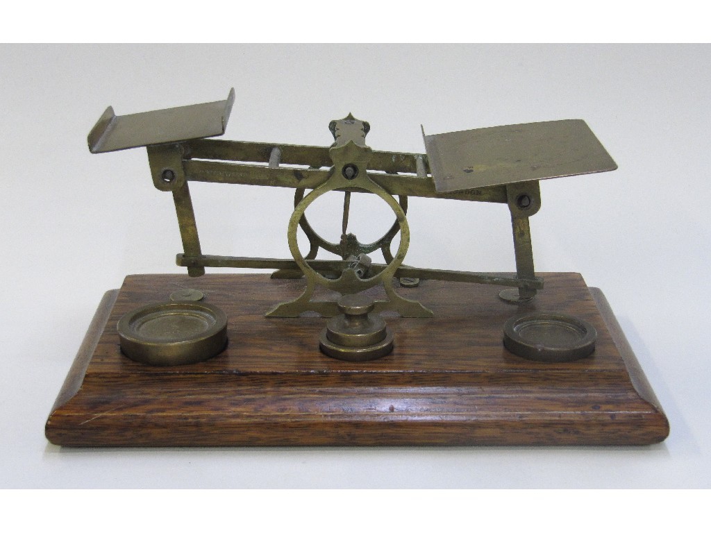 Appraisal: Set of brass postal scales with weights