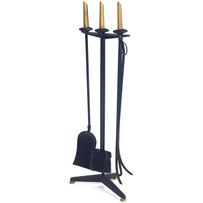 Appraisal: Donald Deskey fire tools by Bennett USA s cast-iron stand