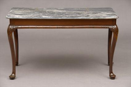 Appraisal: GEORGE II CARVED MAHOGANY CONSOLE TABLE The marble top above