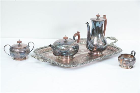 Appraisal: FIVE PIECE SILVER PLATE COFFEE TEA SERVICE With scrolling repousee