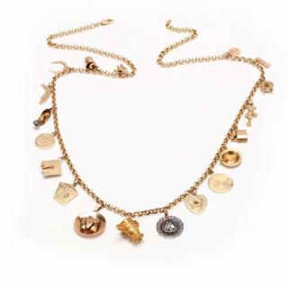 Appraisal: KT Charm Necklace the rolo chain necklace with charms to