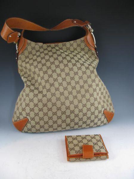 Appraisal: Gucci Logo Saddle Bag with gold tone horsebit accented trim