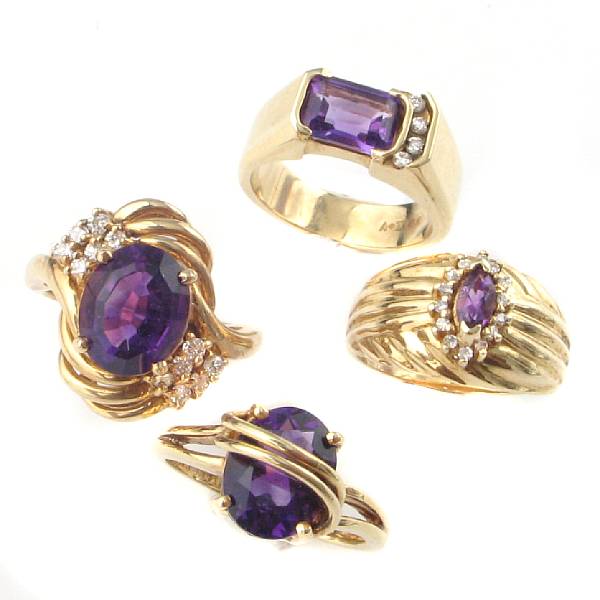 Appraisal: A collection of amethyst diamond tanzanite and gold rings fifteen