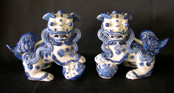 Appraisal: Pair of Kuang Hsu Blue-and-White Porcelain Figures of Foo Dogs