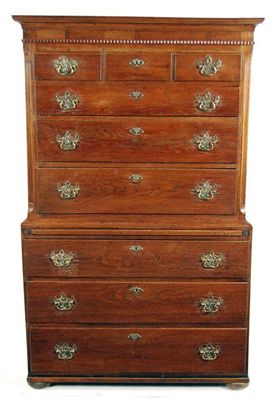 Appraisal: A George III oak chest on chest the moulded cornice