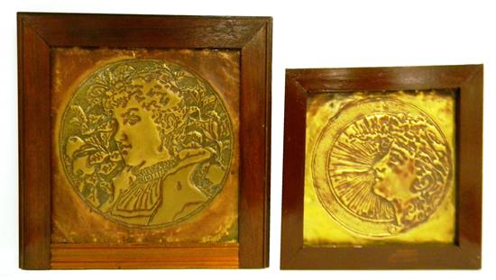 Appraisal: Two Arts Crafts style hammered brass wall plaques in wooden