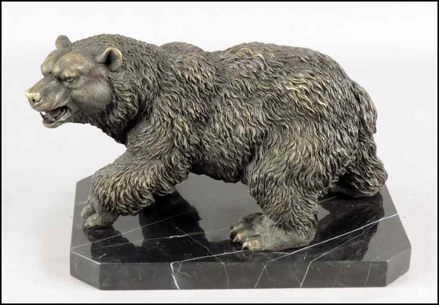 Appraisal: PATINATED BRONZE BEAR Raised on a '' marble plinth Height