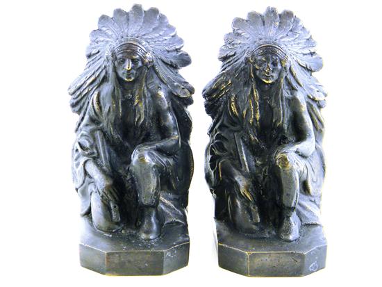 Appraisal: Pair of kneeling Indian bookends metal Native American in full