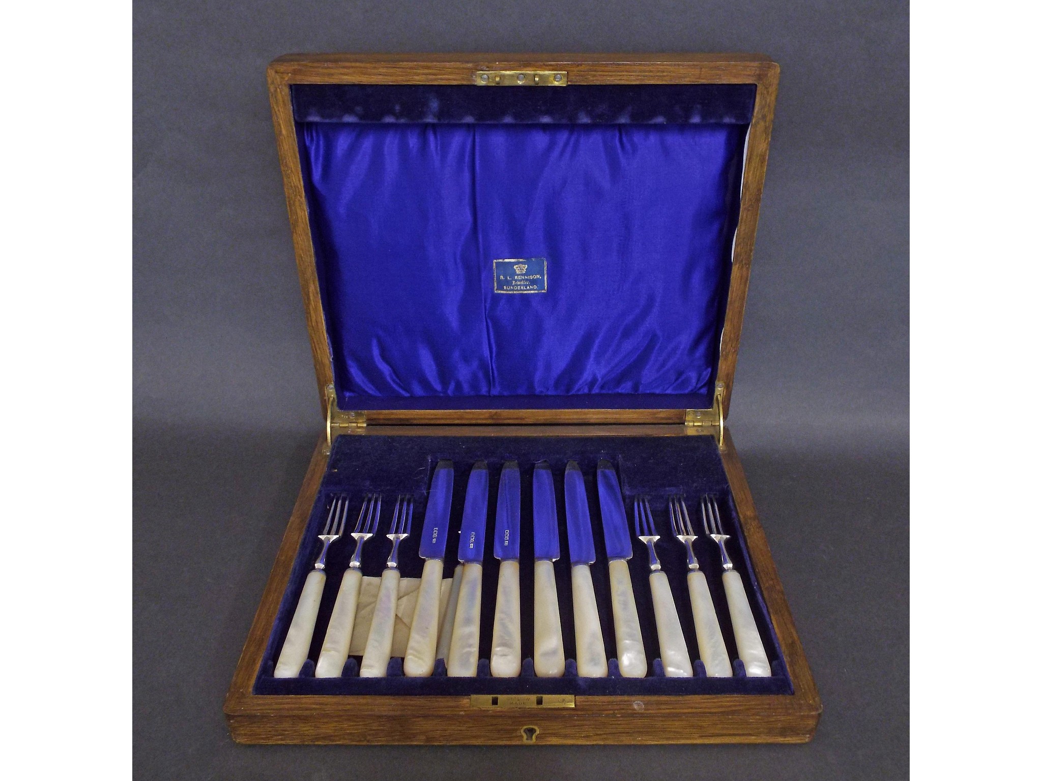 Appraisal: s oak canteen of pearl handled silver cutlery comprising six