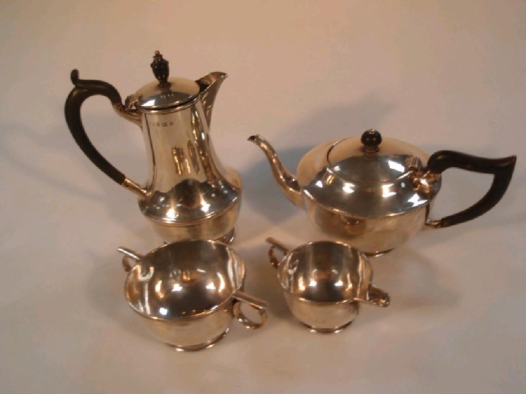 Appraisal: A George V silver matched four piece tea service with