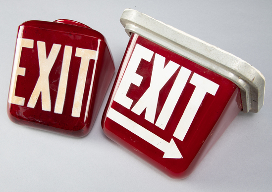 Appraisal: Pair of antique ruby glass Exit Signs with raised letters