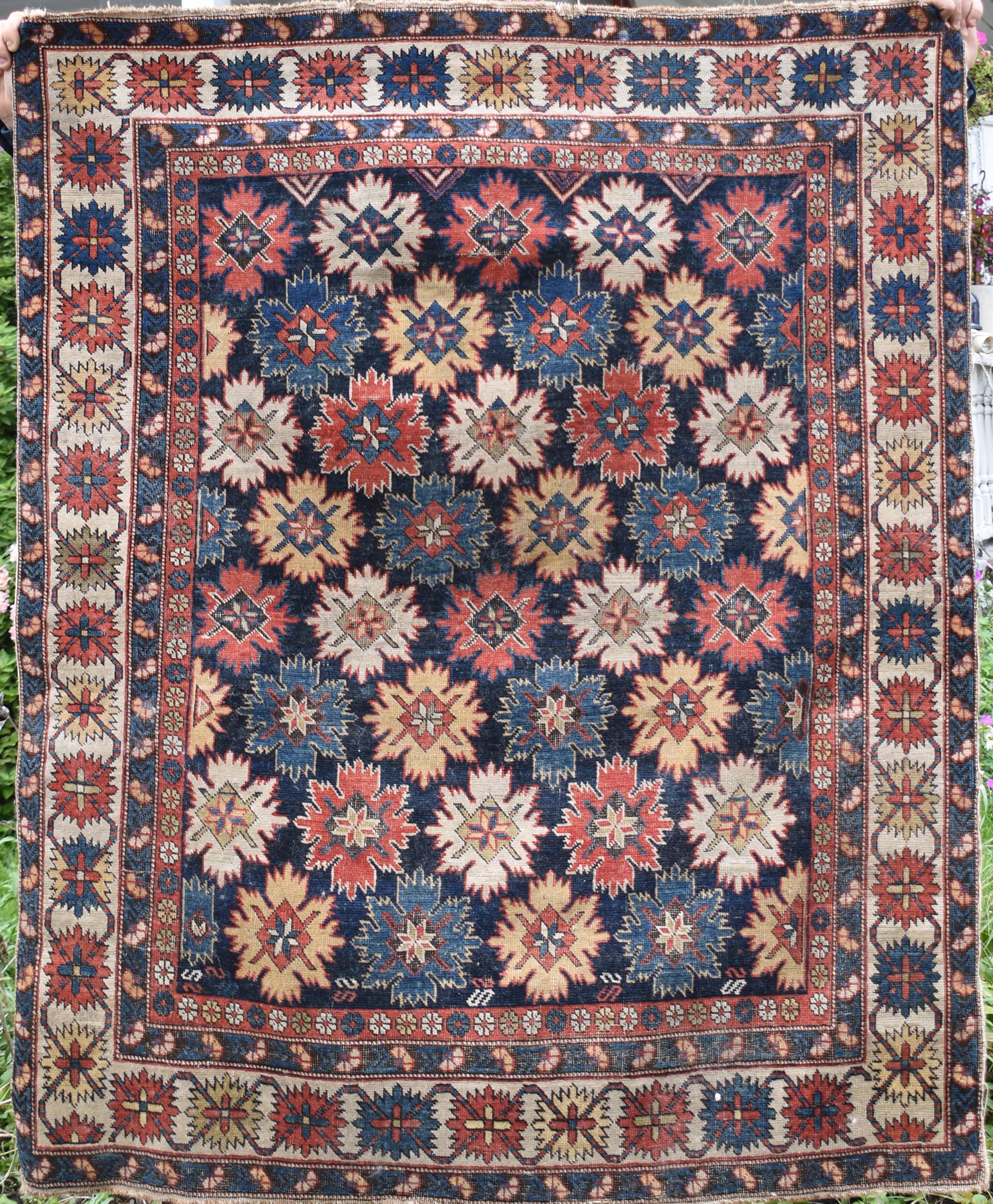 Appraisal: ANTIQUE CAUCASIAN SCATTER RUG An antique Caucasian scatter area rug