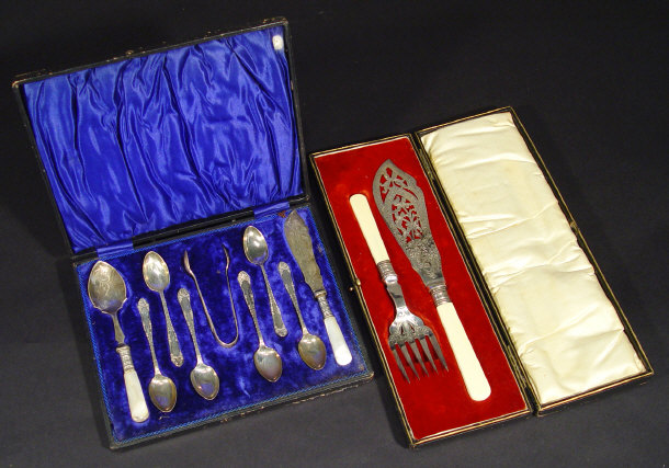 Appraisal: Chased silver plated fish knife and fork pierced with flowers