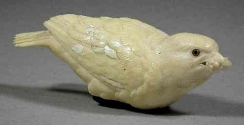 Appraisal: An early th Century Japanese carved ivory figure of a