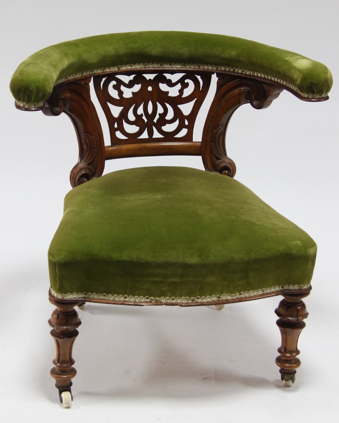 Appraisal: An early Victorian walnut elbow chair the padded crest rail