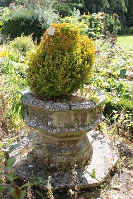 Appraisal: A HADDONSTONE LARGE OCTAGONAL GOTHIC STYLE PLANTER on a conforming