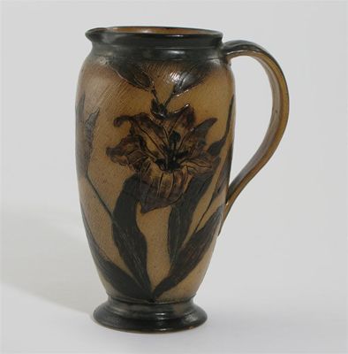 Appraisal: A Martin Brothers stoneware jug incised with lily sprays on