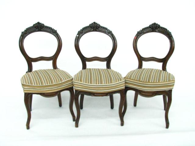 Appraisal: Set of six finger-carved balloon-back Victorian dining chairs upholstered seats