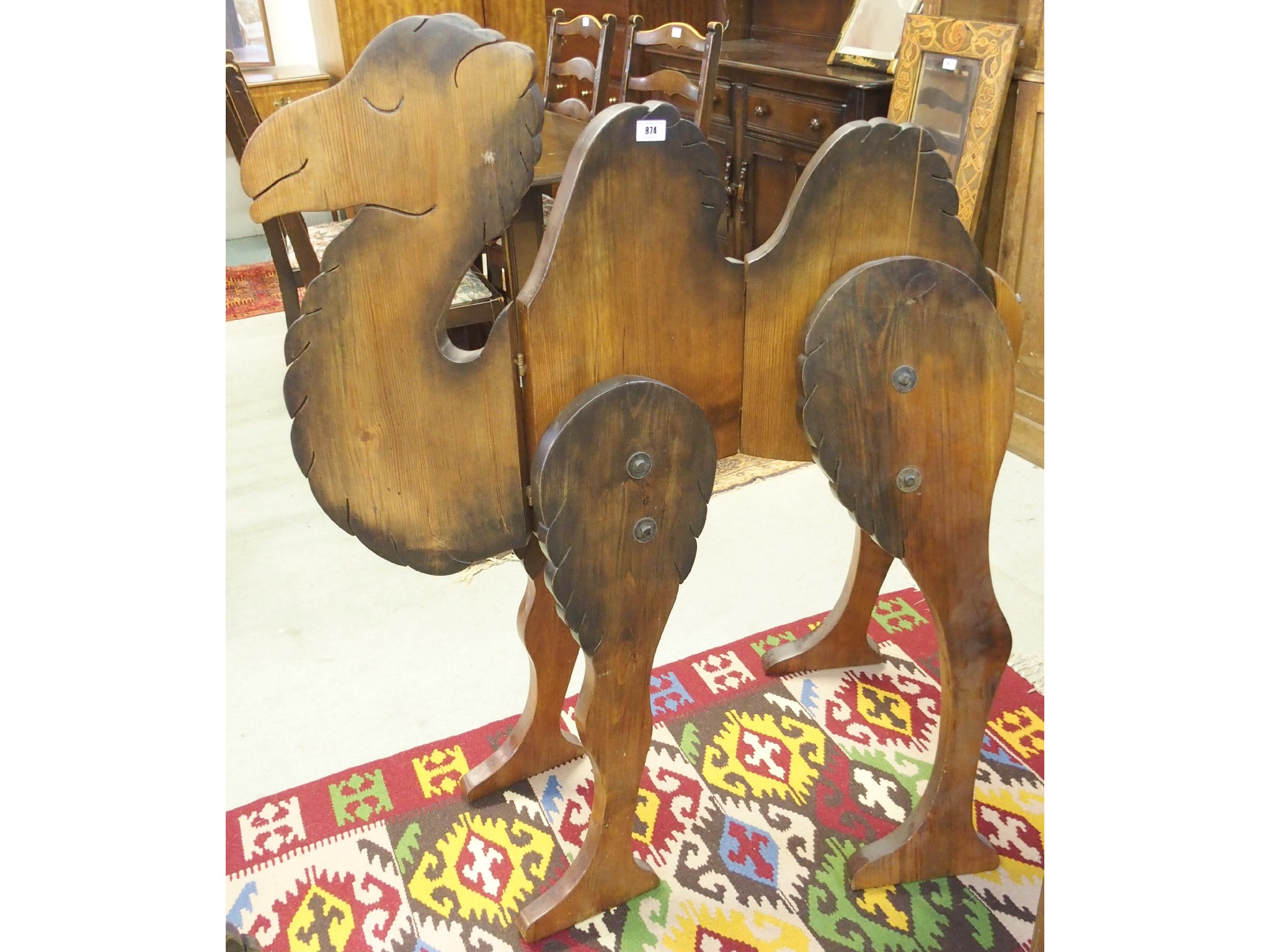 Appraisal: An articulated wooden camel x cm