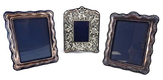 Appraisal: STERLING Three th C sterling silver picture frames English one