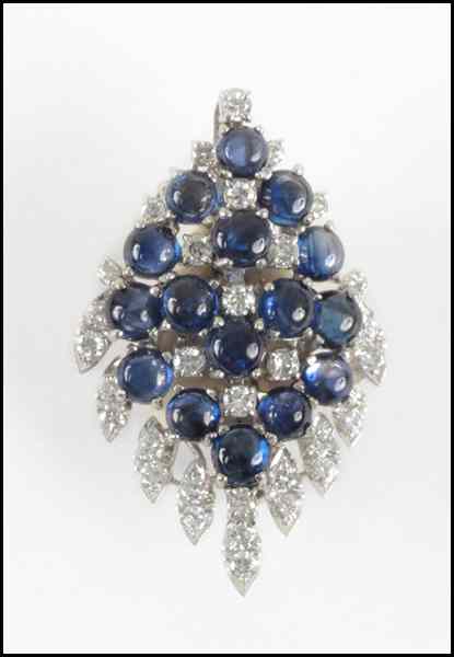 Appraisal: DIAMOND SAPPHIRE AND KARAT WHITE GOLD PENDANT ENHANCER Comprised of