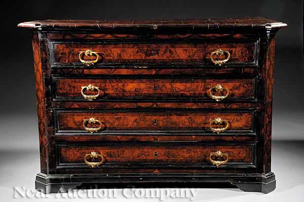 Appraisal: A Continental Baroque Ebonized Inlaid and Burl Walnut Commode th