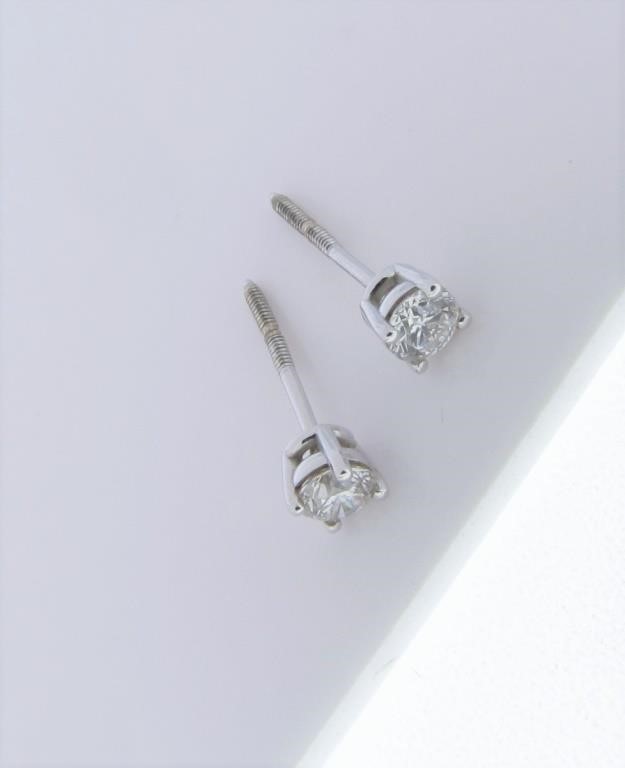 Appraisal: A pair of K white gold mounted ctw diamond stud