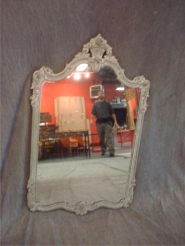 Appraisal: Carved wood and white painted mirror with basket crown Dimensions