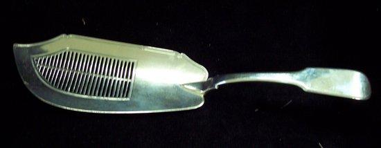 Appraisal: A fiddle pattern fish slice the blade with pierced grille