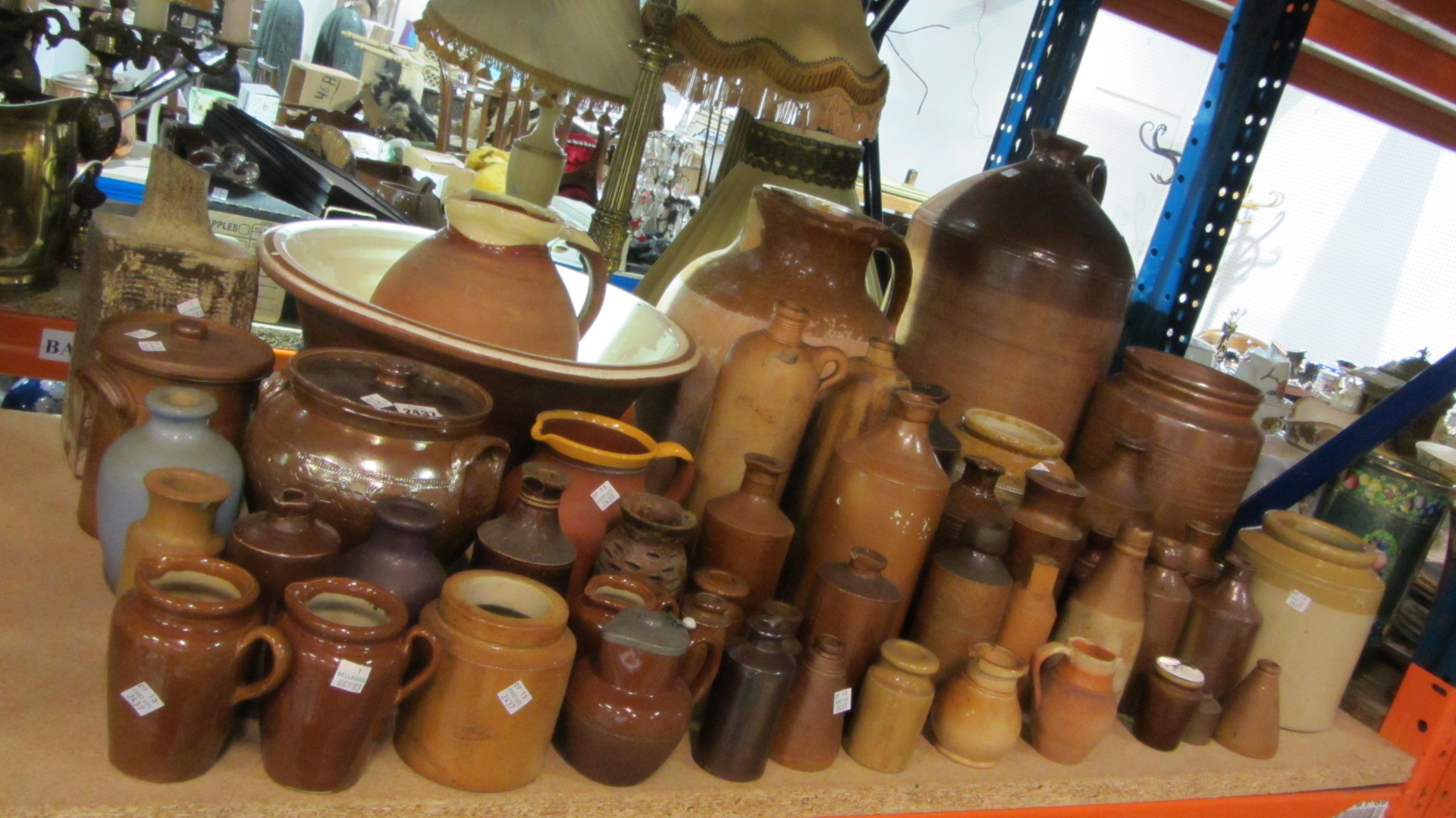 Appraisal: A large quantity of Stoneware bottles vases bowls and sundry