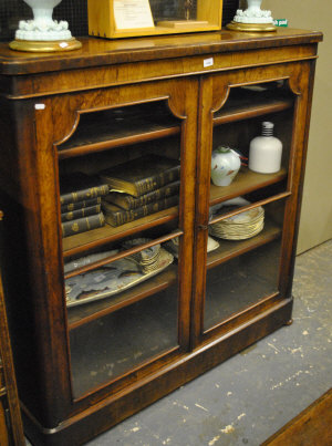 Appraisal: A Victorian walnut bookcase with twin glazed doors