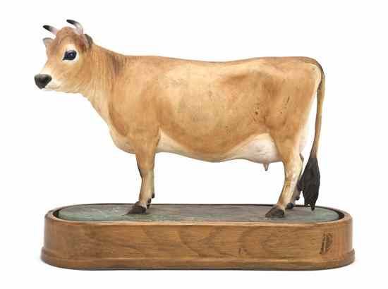 Appraisal: An English Bone China Model of a Cow Doris Lindner