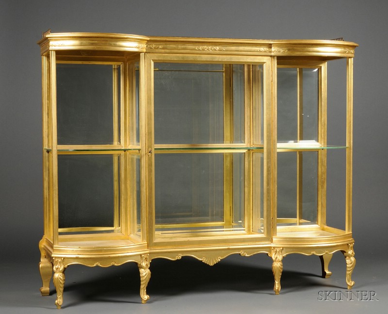 Appraisal: Louis XV Style Giltwood Vitrine th century with rounded ends