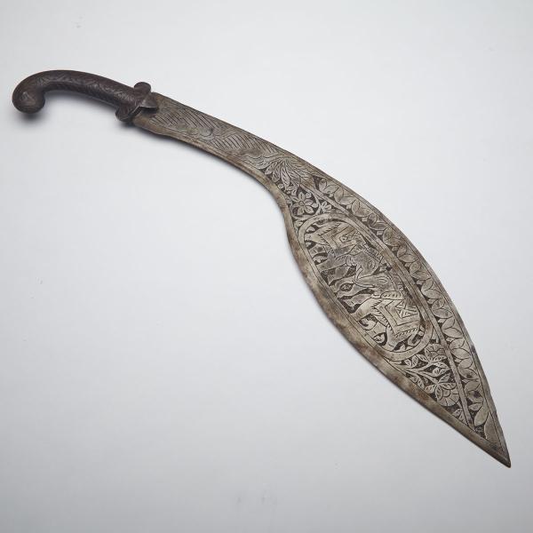 Appraisal: Indian Kukri th century with foliate engraved decoration overall the